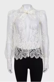 Sheer white blouse with ties