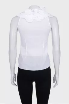 White sleeveless blouse with ruffles