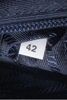 Blue cosmetic bag with logo