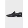Men's black leather shoes with perforations