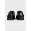 Men's black leather shoes with perforations