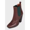Brown ankle boots with stacked heels