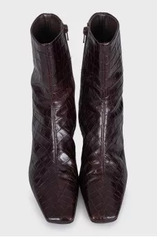 Leather ankle boots with embossed heels