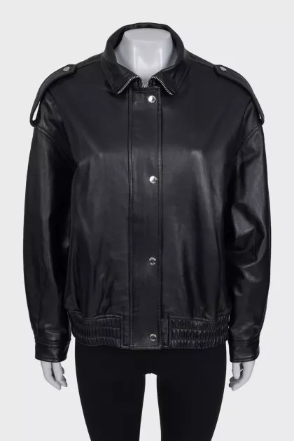 Slim-fit leather jacket with a zipper and buttons