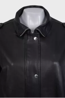 Slim-fit leather jacket with a zipper and buttons