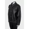 Slim-fit leather jacket with a zipper and buttons