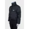 Black zip-up jacket with logo