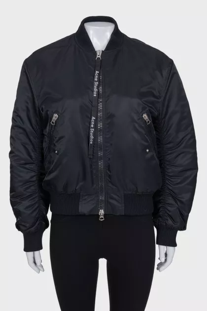 Black bomber jacket with a zipper