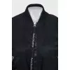 Black bomber jacket with a zipper