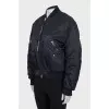 Black bomber jacket with a zipper