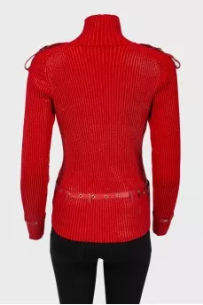 Red sweater with leather straps