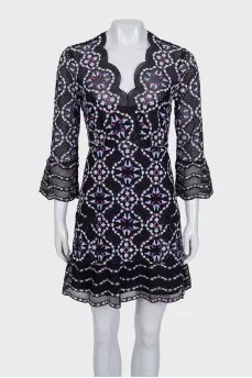 A fitted lace dress with embroidery