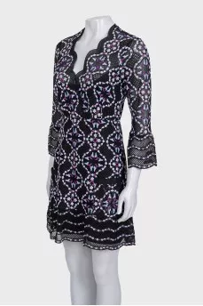 A fitted lace dress with embroidery