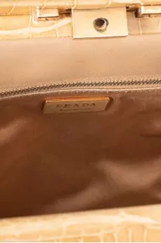 Бежевая сумка в анималистический принт