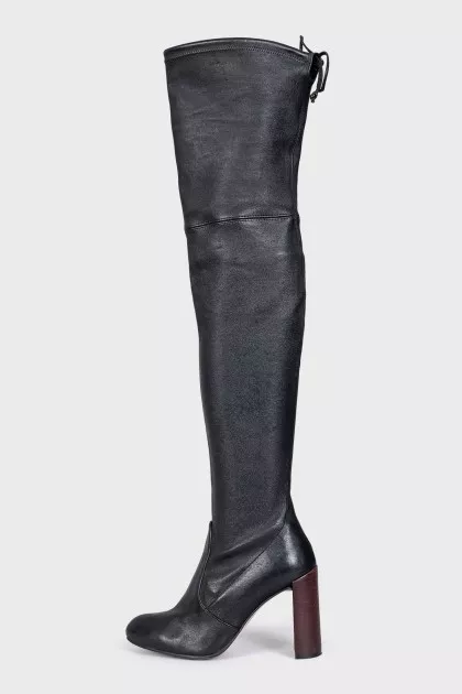 Black leather over-the-knee boots with heels