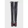 Black leather over-the-knee boots with heels