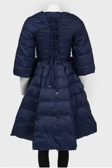 The dark blue jacket is flared up