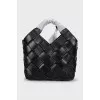 Black leather bag with weave
