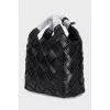 Black leather bag with weave