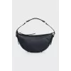 Black leather bag with silver hardware