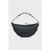Black leather bag with silver hardware