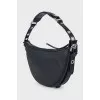 Black leather bag with silver hardware