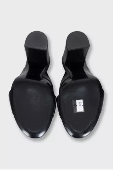 Black leather high-heeled sandals