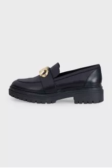Black leather loafers with signature logo
