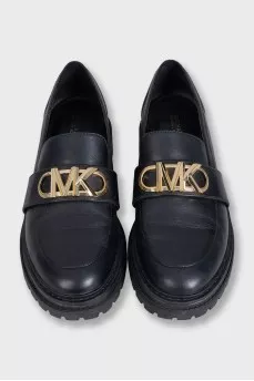 Black leather loafers with signature logo