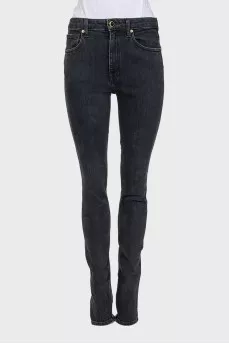 Mid-rise tapered jeans with zippers at the bottom