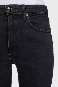 Mid-rise tapered jeans with zippers at the bottom