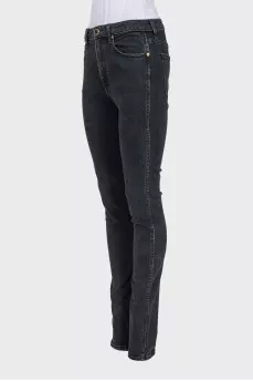 Mid-rise tapered jeans with zippers at the bottom