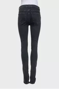Mid-rise tapered jeans with zippers at the bottom
