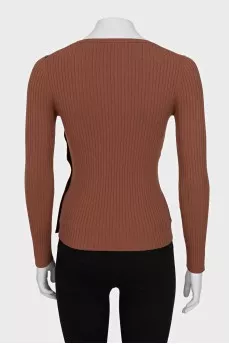 Fitted jumper with buttons on the side