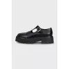 Black embossed leather shoes