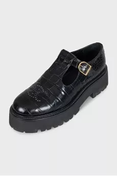 Black embossed leather shoes