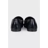 Leather loafers with tag