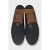 Leather loafers with tag