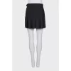 Large pleated skort with buckle