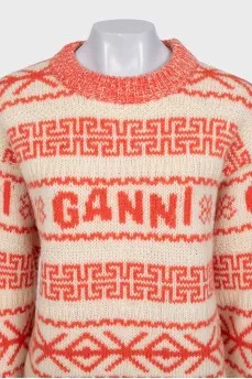 Orange sweater with knitted logo