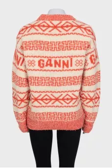 Orange sweater with knitted logo