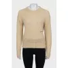 Translucent jumper with embroidered logo