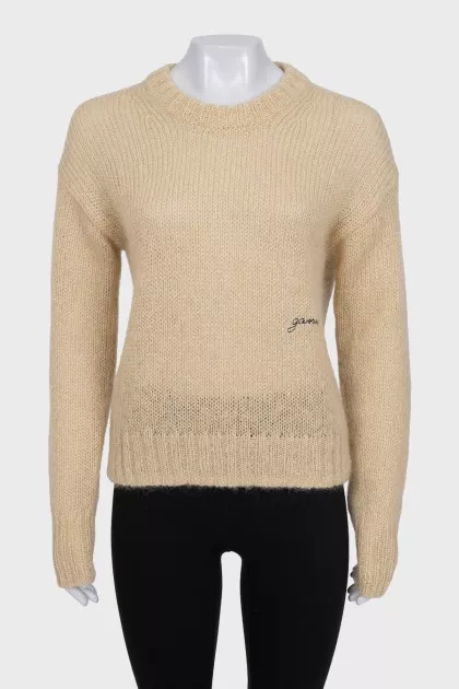 Translucent jumper with embroidered logo