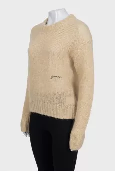 Translucent jumper with embroidered logo