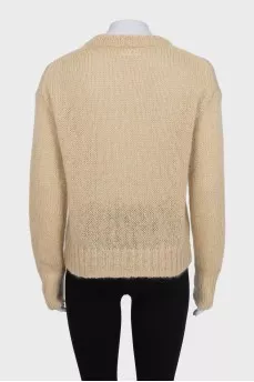 Translucent jumper with embroidered logo