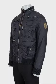 Men's black jacket with a patch on the sleeve