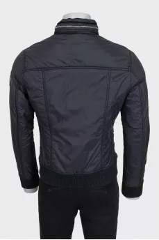 Men's black jacket with a patch on the sleeve