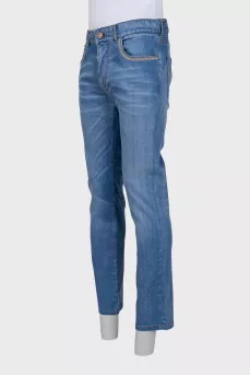 Men's blue jeans with embroidery on the pocket