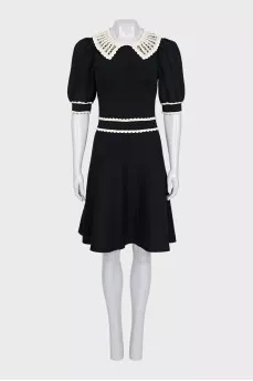 Black fitted dress with lace trim