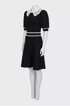 Black fitted dress with lace trim